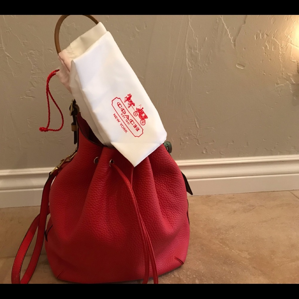 AUTHENTIC “COACH HANDBAG”/{dust bag..included}…